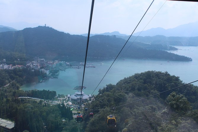 1-day Tour to Sun Moon Lake from Taipei by High Speed Rail - Temples, pagodas, and sunset light