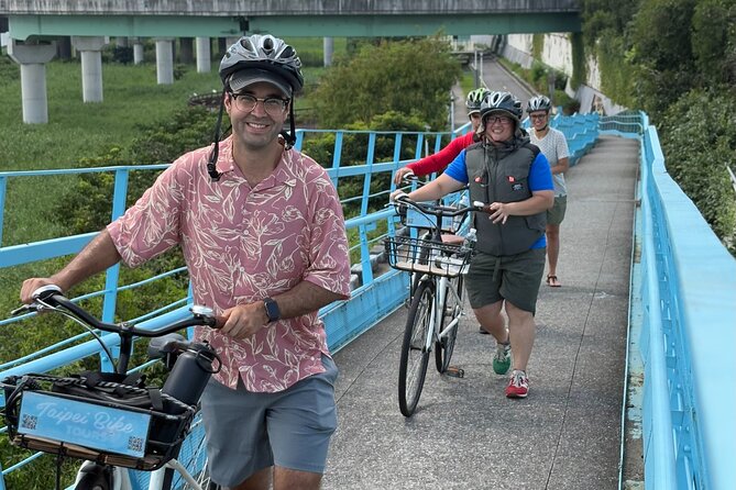 4 Hour Afternoon Cycling City Tour North with Snack - Dadaocheng Pier and the riverfront pause