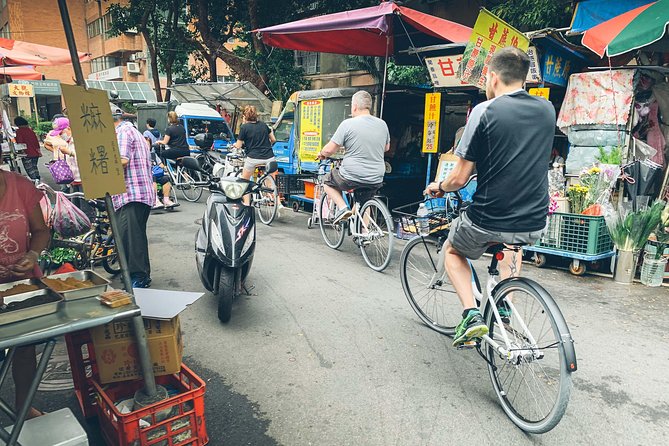 4-Hour Morning Cycling City Tour (incl. breakfast) - The river at Dadaocheng Pier Plaza