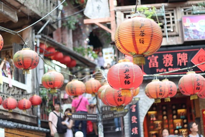 6 Hours Private Charter from Taipei in Shifen and Jiufen - Shifen Old Street: snacks, souvenirs, and a train at close range
