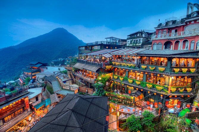 7-Hour Jiufen Night View, Shifen Waterfall & Raohe Market Tour - Shifen Old Street and the sky lantern ritual