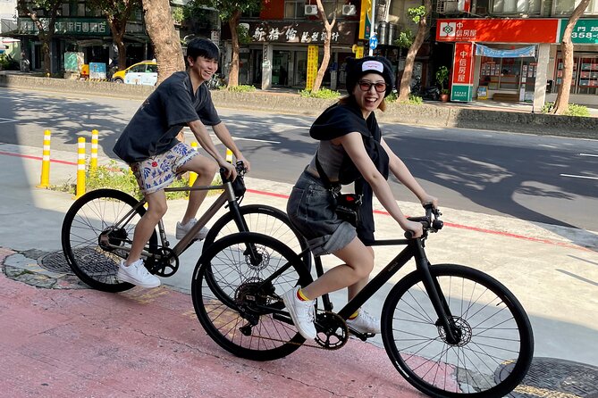 Best E-bike Cycling Tour in Taipei - Includes Local Food & Drinks - Four Four South Village beneath Taipei 101