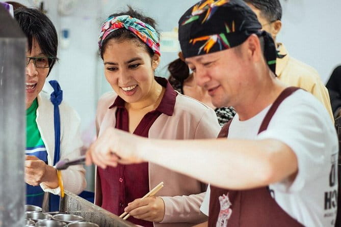 Taiwanese Cooking Class with Traditional Market Tour - Cooking three Taiwanese dishes by hand